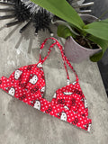 Red polka dot bikini top with Hello Kitty 