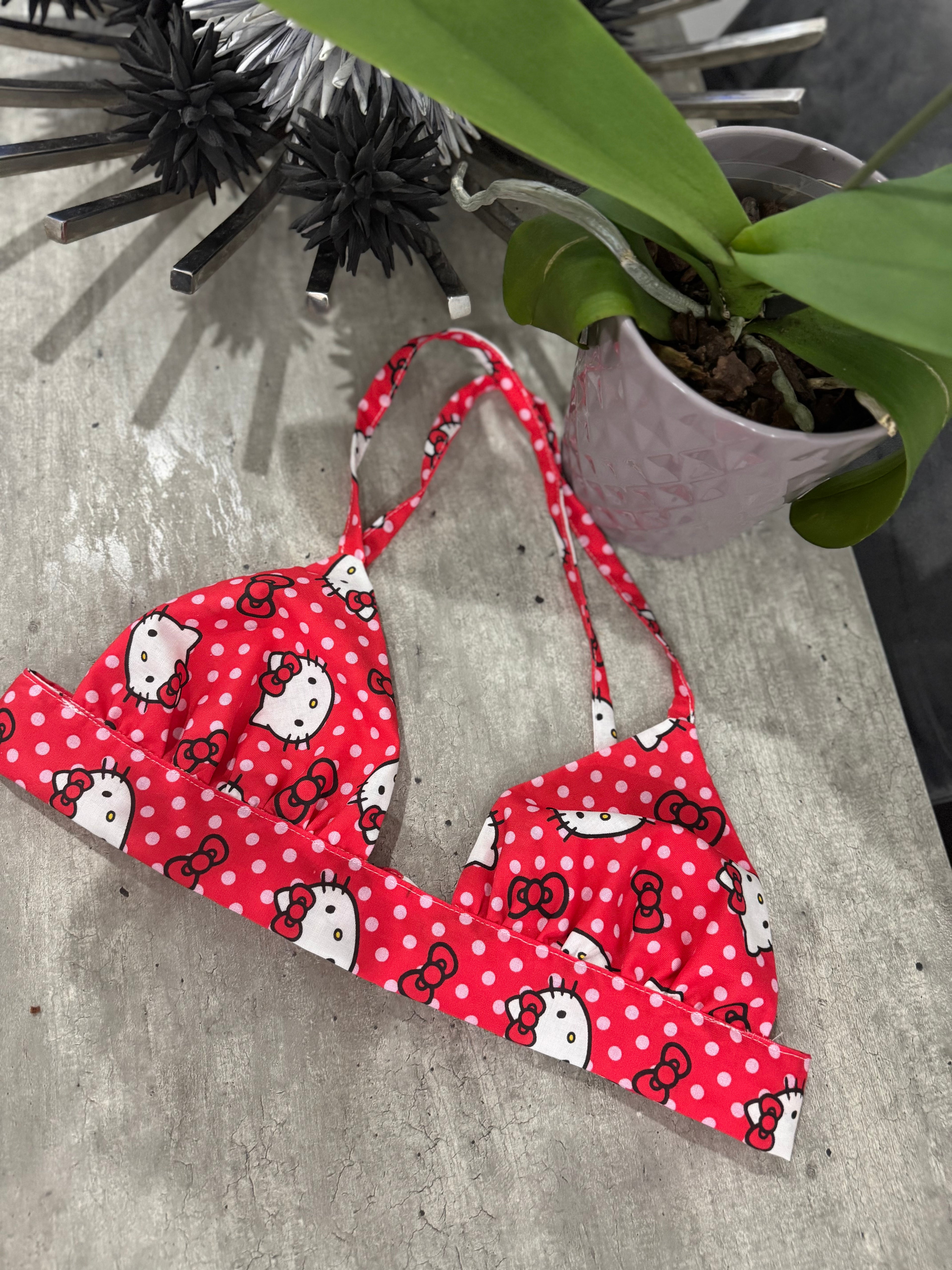 Red polka dot bikini top with Hello Kitty 